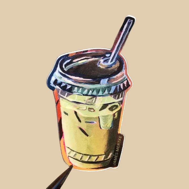 This sticker depicts an iced matcha latte in a to-go cup with a straw sticking out the top.