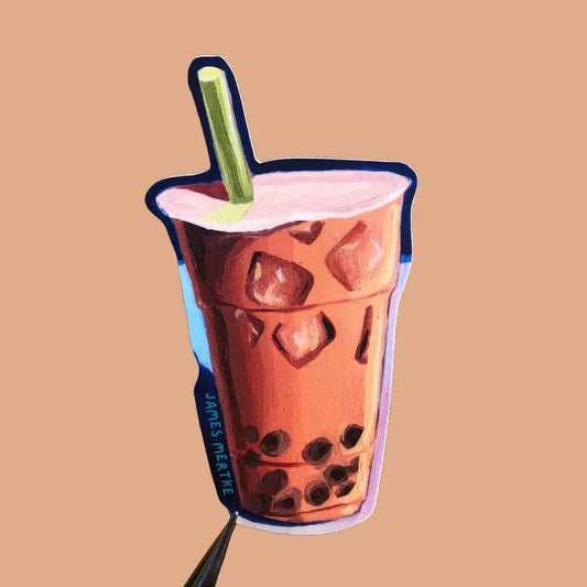 This sticker features a painting of an iced boba milk tea that's orange in color with a green straw.