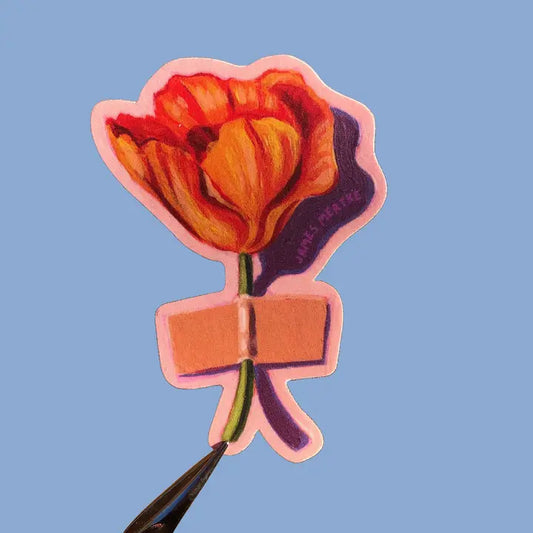 This sticker depicts a painting of an orange California poppy that has been taped to a surface by its stem.