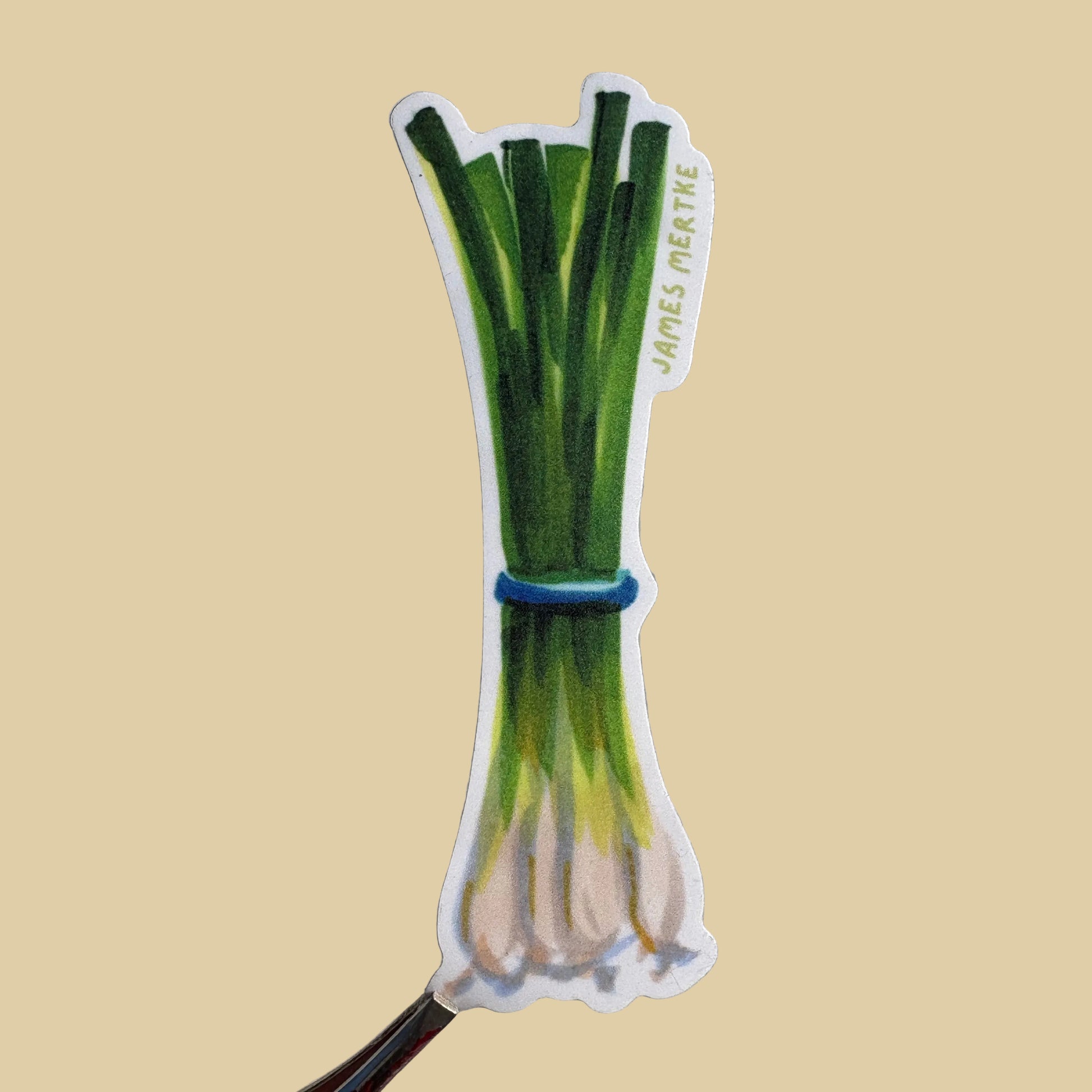 A sticker of a bundle of green onions.