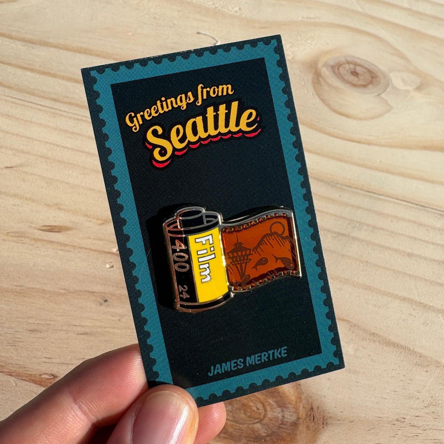 Seattle Film Roll Illuminating Enamel Pin