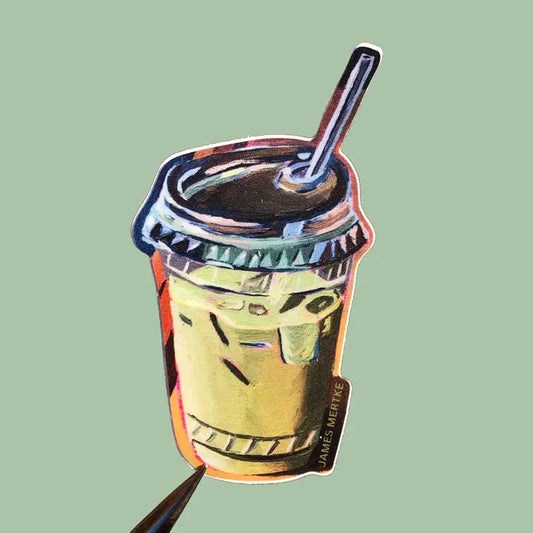 This sticker depicts an iced matcha latte in a to-go cup with a straw sticking out the top.