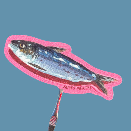 A Painting of a sardine has been turned into a die cut sticker with a pink border.